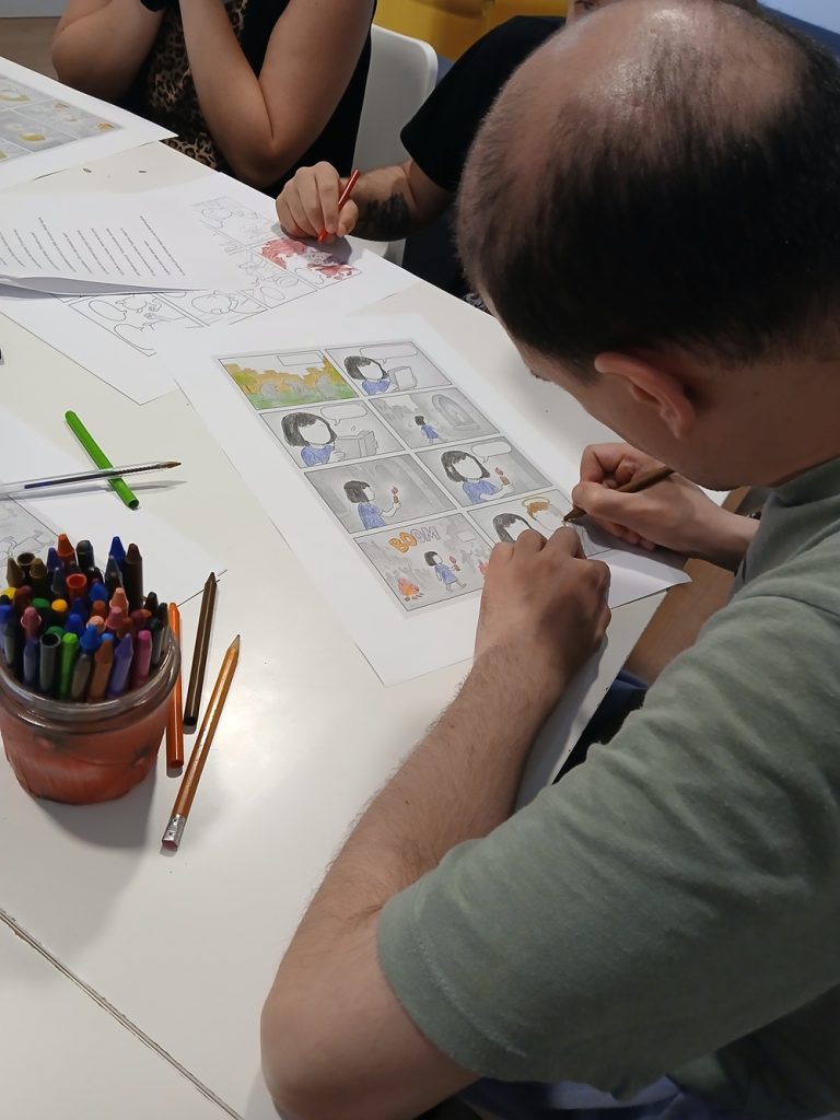 Personas en taller de comic