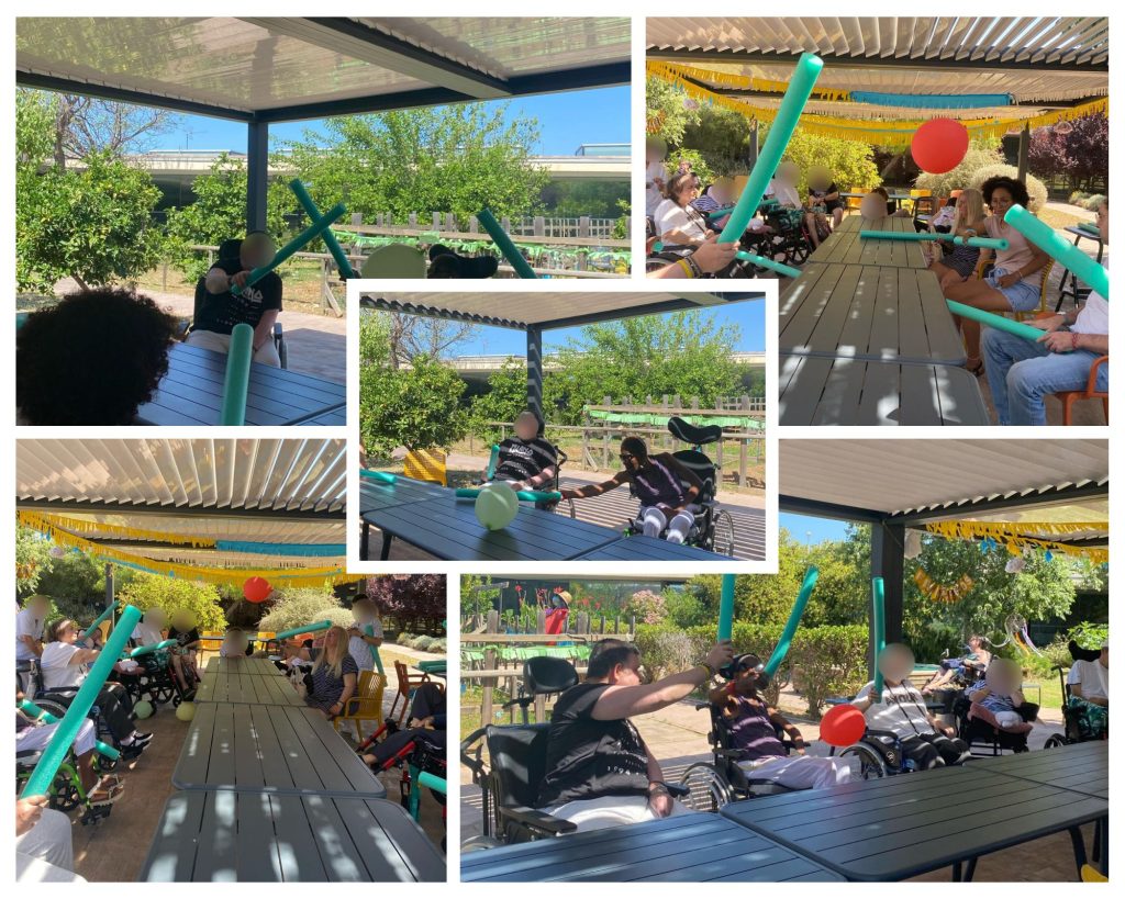 Personas mayores haciendo actividades de tenis de mesa